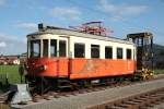 Attergaubahn - Der zuletzt nur als Arbeitstriebwagen genutzte BET 23 102 (Bj. 1912, Grazer Waggonfabrik) steht zusammen mit dem Turmwagen X 26 226 abgstellt im Bf St. Georgen i.A. am 13.10.2011.