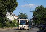 Tw.410 + 112 in Baden am Kaiser Franz Joseph Ring kurz vor der Endstelle Josephsplatz, die Zielanzeige wurde bereits für die Rückfahrt nach Wien eingestellt. (03.07.2021)