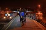 EN 57-2052 und EN 57-976 der PKP am Abend des 05.11.2011 im Bahnhof Szczecin Glowny.