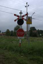 Typischer BÜ in Polen, hier  bei  Mlynsko  01.08.2014  14:13 Uhr