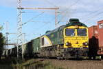 Freightliner 66001 (3650 000-4) kommt mit einem Kohle Leerzug am Fotopunkt in Dedensen-G�mmer vorbei 22.10.2026