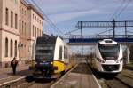 820 011-5 (SA134-004) und 140 306-3 (31WE-005D) stehen am 17.04.2014 in Węgliniec zur Abfahrt bereit