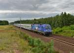 370 010 mit einem EC nach Warschau am 21.07.2012 bei Boczow. 