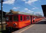 EN57-1754 der PKP in rot/orange am 24.06.2005 in Warszawa Zachodnia (Warschau)