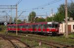 Sauber und gepflegt prsentiert sich am 3.5.2012 der Altbau Triebwagen EN 57 1536  im Bahnhof Bialystok in Polen.