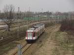 EN95-01 als WKD-140 in Warszawa-Aleje Jerozolimskie, 28.03.2010