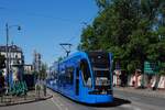 Krakau: RY823 der Linie 18 nach Czerwone Maki P+R �berquert den Plac Nowy Kleparz.