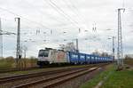 186 274 der Lotos führte am 13.04.21 einen Ganzzug China-Container durch Saarmund Richtung Potsdam.