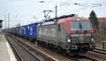 PKP CARGO S.A., Warszawa [PL] mit  EU46-515  [NVR-Nummer: 91 51 5370 027-2 PL-PKPC] und Containerzug am 04.03.21 Durchfahrt Bf. Berlin Köpenick.