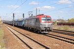 PKP Vectron EU46-505 (5370 017-3) mit einem PKP Cargo Falns Ganzzug in Berlin-Schönefeld Flughafen und fuhr weiter in Richtung Glasower Damm.
