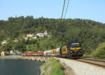 335 036 passes Baiao while hauling Medway freight train 50323 from Vila Nova de Gaia to Godim, 27 March 2022
