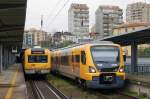 Bahnen in Portugal: CP 3406 und CP 2265 anlässlich einer Zugskreuzung im Bahnhof GENERAL TORRES am 26.