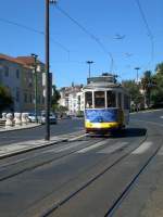 Carris Linie 28 nach M.Moniz. 
Werbung sieht auf nostalgischen Bahnen gewhnungsbedrftig aus...
Lissabon August 2008.