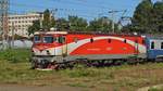 E-Lok 91-53-0-477753-4 zieht am 15.09.2017 mit internationaler Garnitur von Bukarest nach Budapest in Bahnhof Brasov ein.