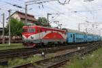 Mit einem Doppelstockzug fhrt 91-53-0-461-036-2 am 12.5.2010   aus dem Bahnhof Timisoara Nord nach Arad aus.