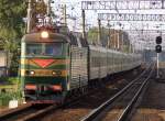 Electric locomotive CHS7 (Skoda) pulling passenger train at Kursk line near Moscow, 6.08.2007
