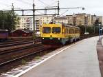 Y1 1326 mit Regionalzug 8914 LT Kil-Karlstad auf Bahnhof Karlstad am 13-7-2000.