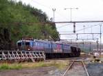 Dm3 1205/1235/1206  Sigrid  fhrt mit leeren Erzzug am 30.08.2007 durch den Bahnhof Katterat nach Kiruna, leider kam der Zug so berraschend, das ich etwas zu spt ausgelst habe, es kommen nur selten