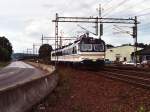 3210 mit Regionalzug 3067 Gteborg-Kungsbacka auf Bahnhof Kungsbacka am 15-7-2000.