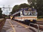 3213 mit Regionalzug 3245 Vnersborg-Gteborg auf Bahnhof Vnersborg am 13-7-2000. Bild und scan: Date Jan de Vries.