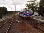 3214 mit Regionalzug 7139 Uddvalla-Bors auf Bahnhof Vnersborg am 13-7-2000.
