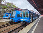 Stockholm Roslagsbanan Zug 234 auf der Linie 27 nach Ormsta neben Zug 720B auf der Linie 29 nach N�sbypark und Zug 201 auf der Linie 29 in Stockholms �stra, 12.05.2026.