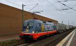 Die Hectorrail 242.502/182 502-5 Zurg ist am Samstagnachmittag den 8.Februar 2014 hier durch Allerheiligen fahrend gen Köln mit einem Klv-Zug am Haken abgelichtet zu sehen. 