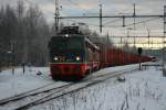 Leerholzzug mit Hectorail 142 104-9  KANE  und 142 003-3  Schmidt  am 30.12.2008 beim Anfahren vom Ausweichstck in Torpshammar.