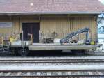 BLS  - Dienstwagen mit Kran  X 40 63 94 05 806-8 im Bahnhof von Grenchen Nord am 16.12.2007