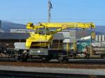 SBB - Baudiesnt Selbstfahrender Kran X Tms 40 85 95 80 050-4 im Gterbahnhof von Biel / Bienne am 17.02.2008 
