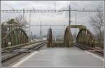 Die ursprnglich einspurige Brcke ber die Landquart und die spter hinzugebaute doppelspurige Brcke am nrdlichen Ende des Bahnhofs Landquart.