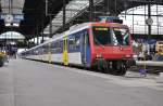 Ein RBDe 562 (zweisystem) mit S1 Regio nach Mulhouse, hier bei Ausfahrt vom Basel SBB am 06 aug 2011.