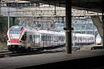 Ausfahrt am 25.10.2014 von RABe 521 018 zusammen mit RABe 522 205 als S3 (Porrentruy - Olten) aus Basel SBB dem Ziel entgegen.