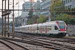 Nachschuss auf den Ausfahrenden RABe 521 020  Porrentruy  am 25.10.2014, als dieser mit einem weiteren RABe 521 als S3 (Olten - Laufen) aus Basel SBS fuhr.