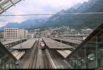 Ausblick von der Postautostation auf den Bahnhof Chur (CH) mit umgebender Landschaft.