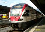 RABe 511 016 am 24.7.2014 im Bahnhof Chur.