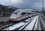 DB - ICE 412 050 bei der einfahrt im Bhf. Thun am 22.01.2024