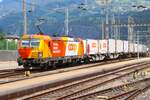Railcare Siemens Vectron 6193 085-8 mit Coop Zug am 10.07.26 in Brig Bhf vom Bahnsteig aus fotografiert 