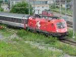 Die EM Lok 1116 075 Schweiz zieht den OEC 160 Vorarlberg von Wien West nach Zrich HB in den Bahnhof Buchs/SG ein.