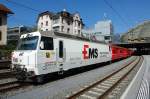 Ein RegioExpress mit seiner Lok Ge 4/4 III 643  Vals  verlsst den Bahnhof Chur in Richtung Disentis und kommt in einigen Minuten auch durch den Ort, fr den er Reklame macht und indem das grosse Chemiewerk steht. 12.4.2007