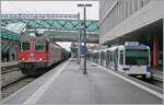 In Renens VD begegnet die SBB Re 6/6 11618 (620 018-2)  Dübendorf  den beiden TL Be 4/6 558 217-6 and 558 220-3 die als m1 (TSOL) auf die baldige Abfahrt nach Lausanne Flon warten. 

28. Januar 2025