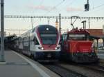 Der Stadler Dosto 511 001 ist am 03.01.2011 im Bahnhof Romanshorn auf Testfahrt, daneben die Ee 922 002