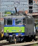 BLS E-Lok 507 fhrt am 29.07.08 mit ihrem Zug in den Bahnhof von Spiez ein.