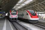 Stadler Dosto nach Wil/SG und ICN nach Lausanne am 25.02.14 in Hbf.St.Gallen