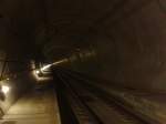 Da mein Onkel beim Gotthard-Basistunnel arbeitet bekam ich die Erlaubnis einmal den Tunnel von Innen zu besichtigen. Hier zu sehen ist die Oströhre des Gotthard-Basistunels im Bereich Amsteg (Blick in Richtung Norden). Hier noch ein paar Daten zum Basistunnel: Der Tunnel ist mit 57 km der längsten Eisenbahntunnel der Welt. Nach Vorarbeiten erfolgte der Tunnelanstich im November 1999. Der Durchschlag in der Oströhre des Tunnels geschah am 15. Oktober 2010, der in der Weströhre am 23. März 2011. Die feierliche Eröffnung ist für den 1. Juni 2016 geplant. Der fahrplanmässige Betrieb soll zum 11. Dezember 2016 aufgenommen werden.