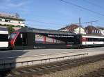 Berner Oberland 2007 - Eingesperrt zwischen zwei EW 4-Einheiten war am Abend des 01.08.2007 die SBB Re 460 026-8 als sie mit einem IC aus Interlaken in Spiez eintrifft.