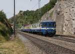 100 Jahre BLS: Der bunte Pendelzug mit dem ex BN RBDe 565 bei Ausserberg am 7. September 2013.
Foto: Walter Ruetsch