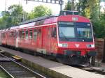 Triebwagen der RM/ bls 2 Kl + Gepckabteil .. RBDe 4/4 566 235-8 im Bahnhof von Ramsei am 07.10.2006