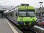 BLS - Triebwagen RBDe 4/4 566 233 an der Spitze eines Regios nach Thun im Bahnhof Burgdorf am 02.02.2014