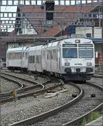 Triebzug RBDe 565 735  White Bull  fotografiert am 29.07.08 bei der Einfahrt in den Bahnhof von Spiez.